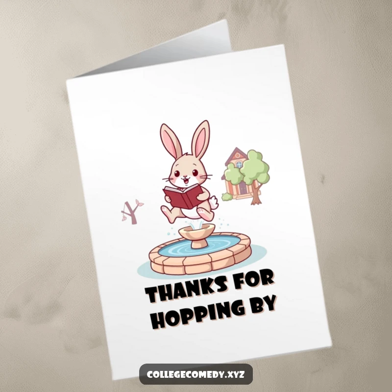 Funny free printable thank you card of a bunny with a book leaping over a campus fountain, showing appreciation.